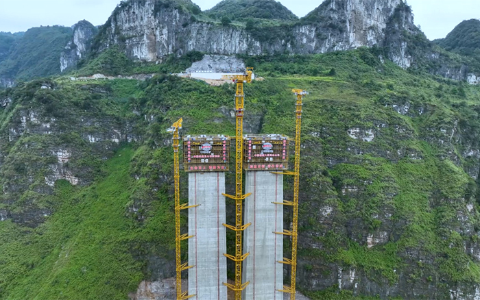 ?塔立山河！yl23455永利塔机挑战“世界之最”